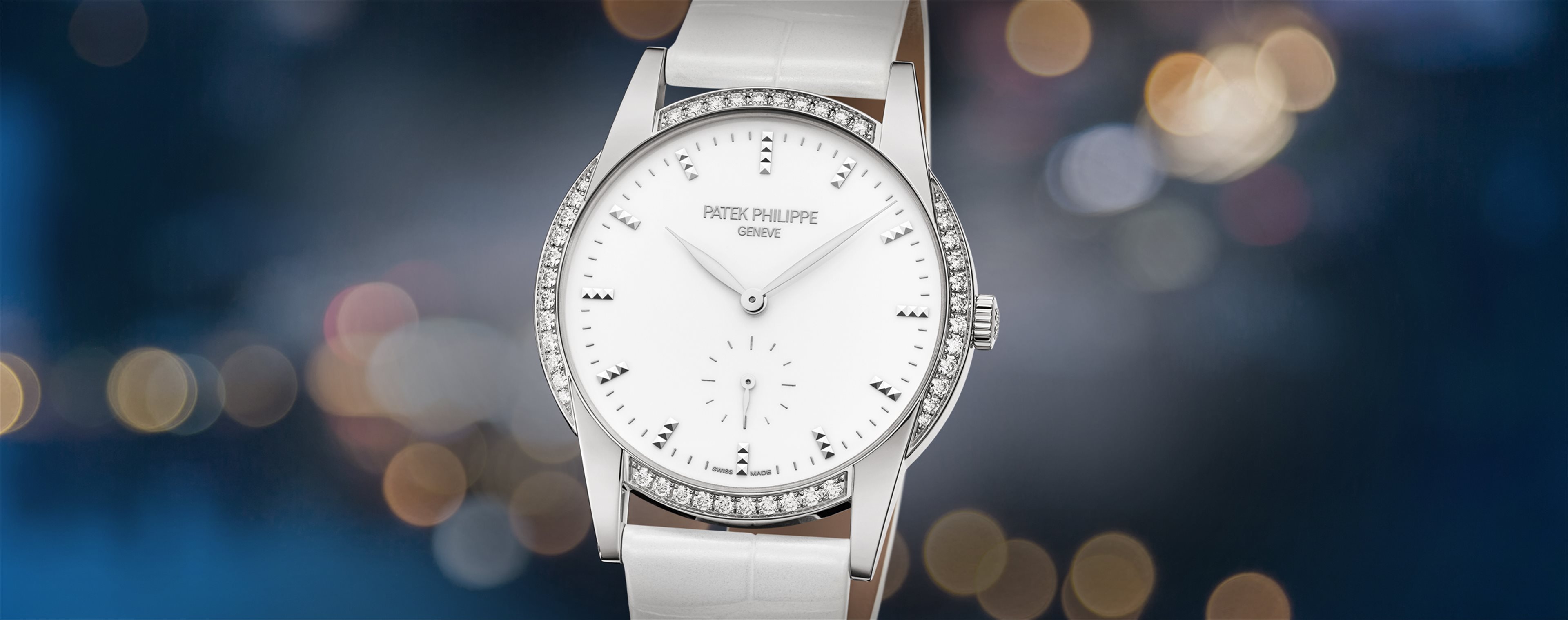 Patek Philippe White Gold Calatrava Ref. 3445 on White Gold BraceletPatek Philippe World Time White Gold Factory Gem Set Bezel Gray-Blue Dial Watch 7130G-014