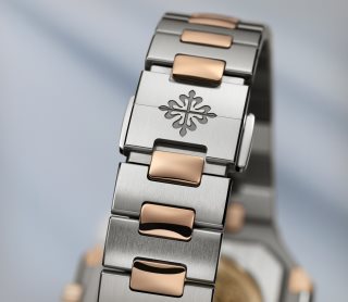 Patek Philippe Cubitus Мод. 5821/1AR-001 Нержавеющая сталь и розовое золото - Aртистический