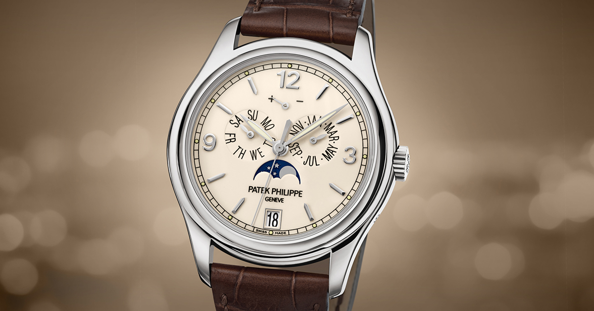 Patek Philippe Twenty~4 Diamond Blue Sunburst Dial Ladies Watch - 4910/1200A-001Patek Philippe 5015G Officers Case Calatrava Watch Moon Circa 2002